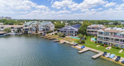 Luxury condo, DISCOUNTED RATES…steps to Lake, sleeps 10, near Yacht Club!