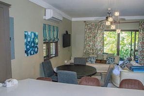 Family Apartment | Living area | Flat-screen TV