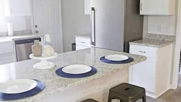 Fridge, coffee/tea maker, cookware/dishes/utensils