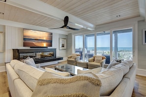 Smart TV, chimenea, reproductor de DVD y futbolito