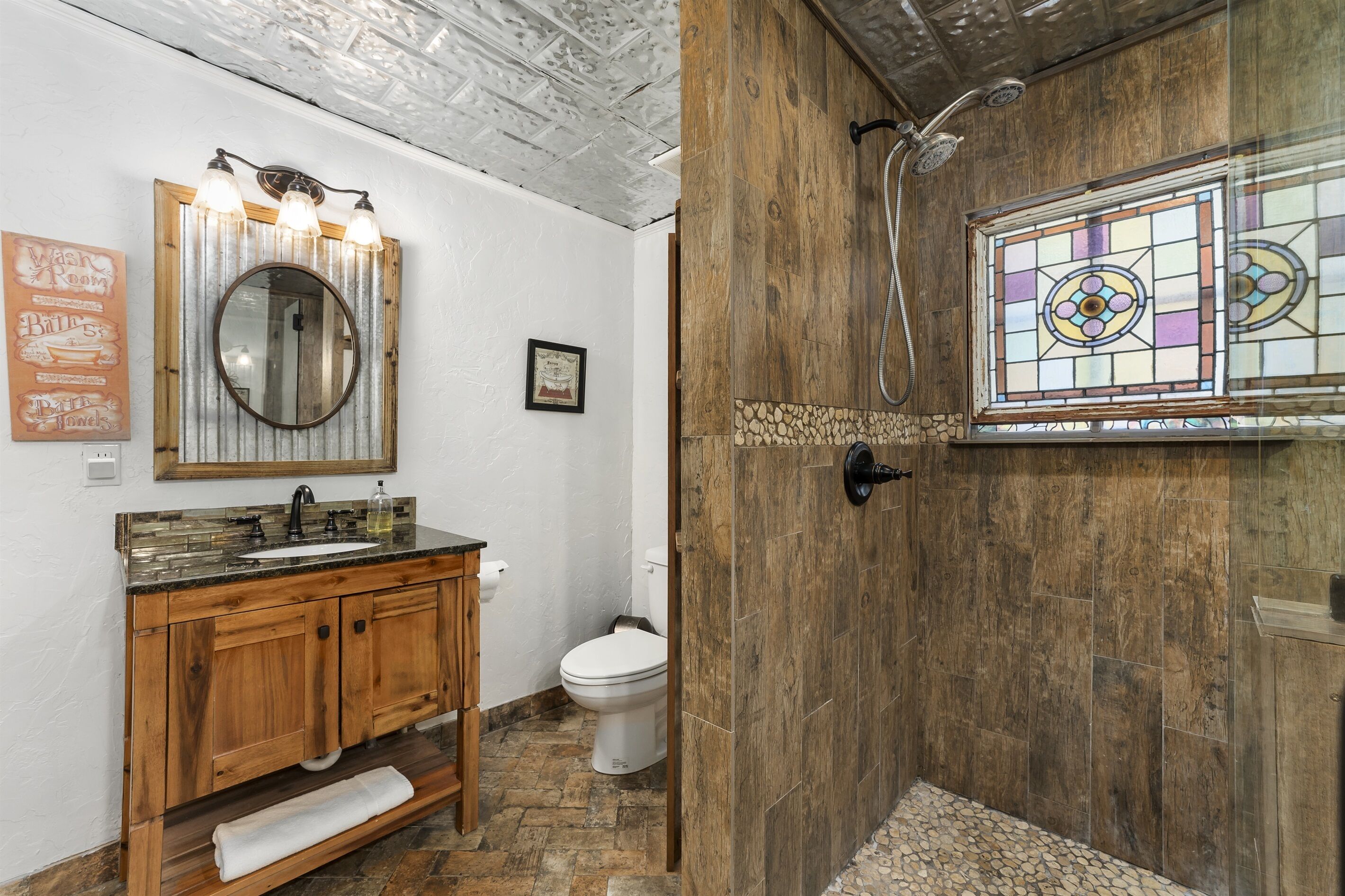 Shower, hair dryer, towels, shampoo