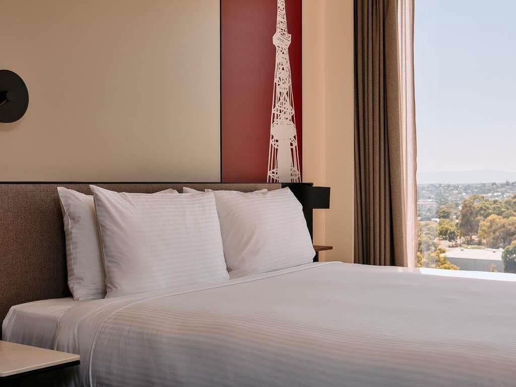 Premium bedding, pillow-top beds, desk, laptop workspace