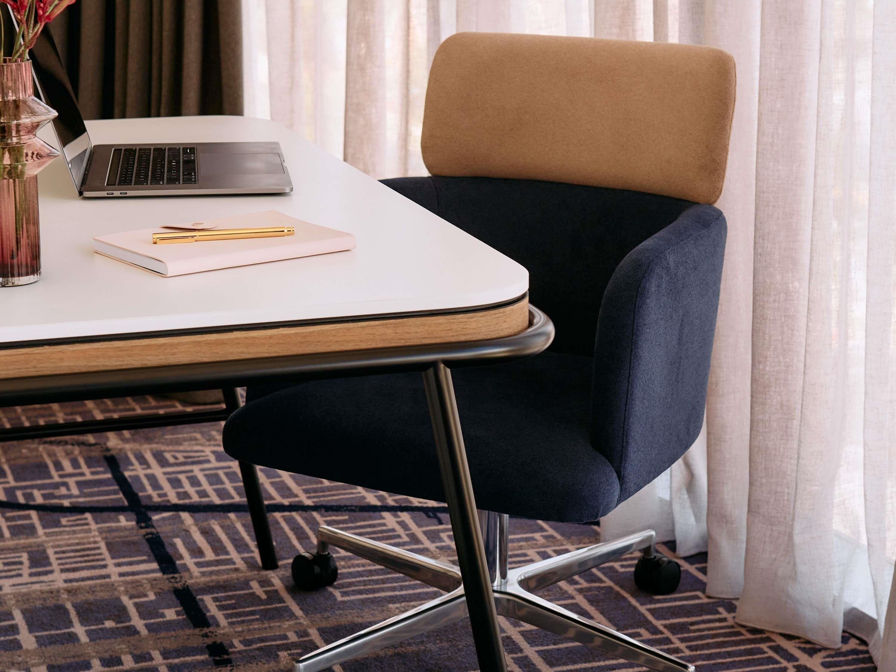 Premium bedding, pillowtop beds, desk, laptop workspace
