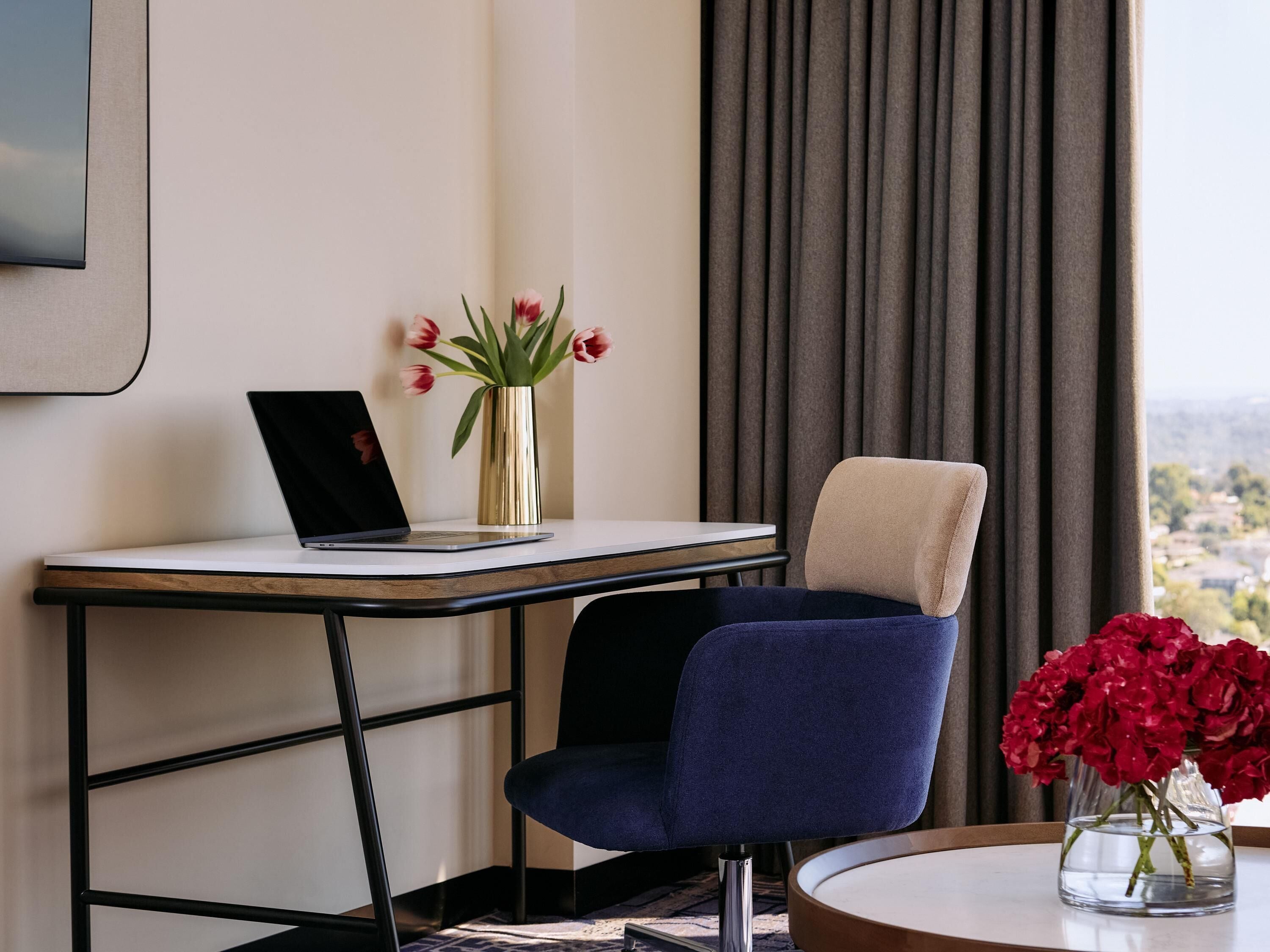 Premium bedding, pillow-top beds, desk, laptop workspace