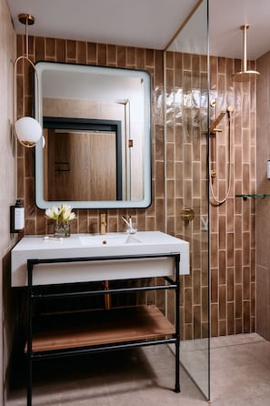 Eco-friendly toiletries, hair dryer, towels, soap