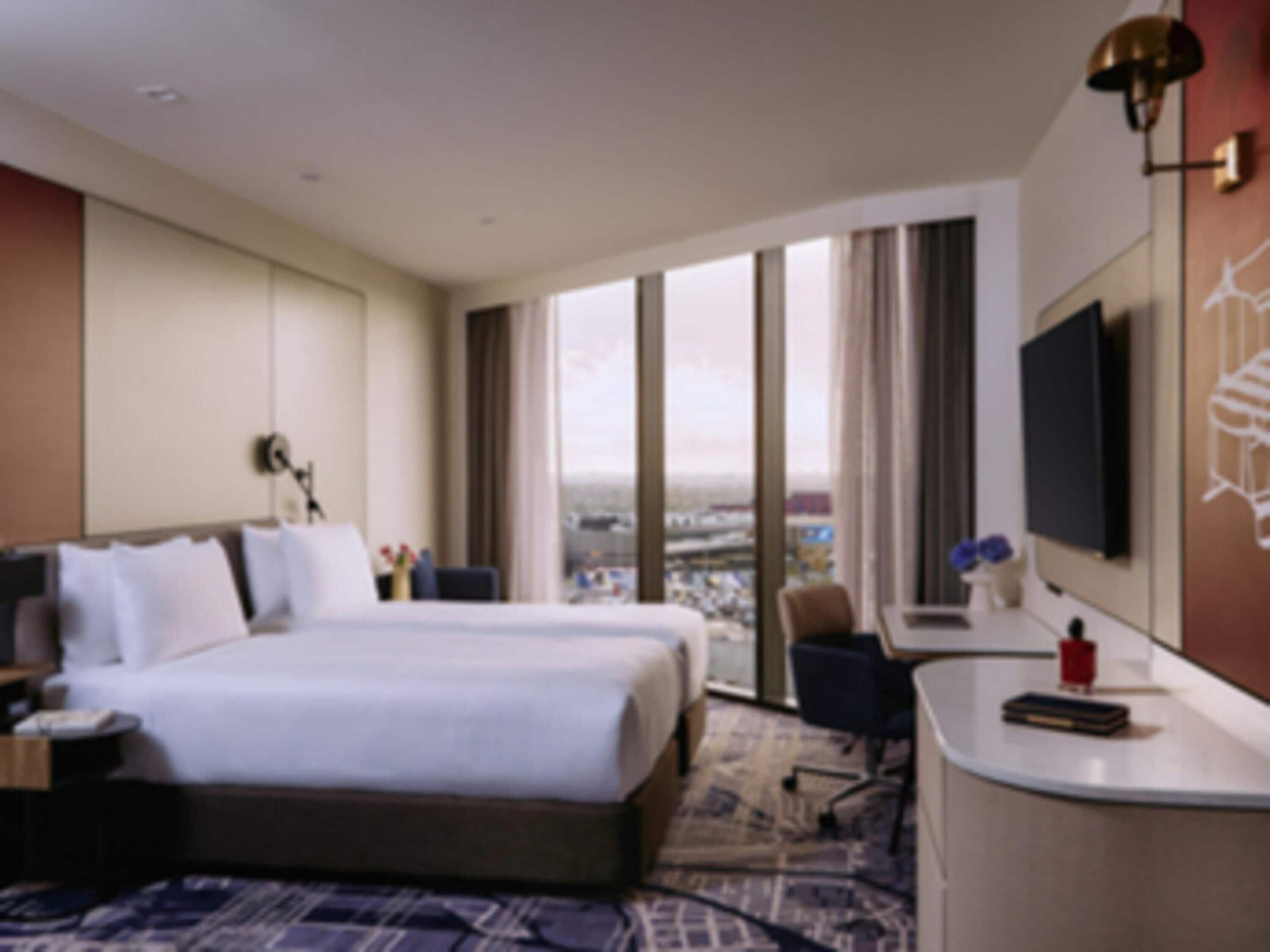 Premium bedding, pillowtop beds, desk, laptop workspace