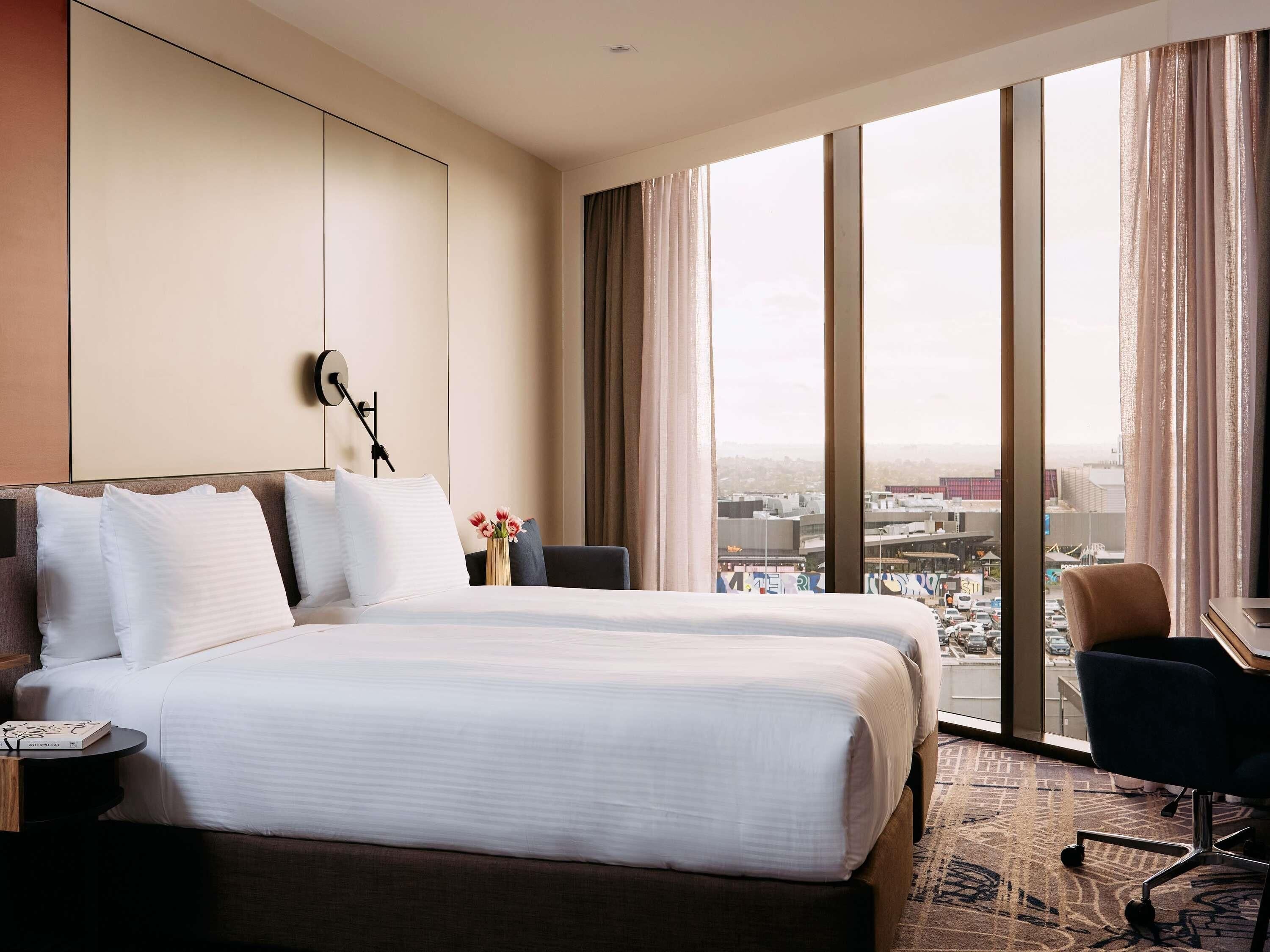 Premium bedding, pillowtop beds, desk, laptop workspace