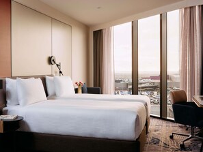 Premium bedding, pillowtop beds, desk, laptop workspace