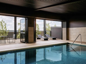Indoor pool, sun loungers