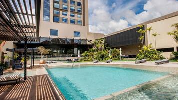 Outdoor pool, open 8:00 AM to 11:00 PM, free pool cabanas