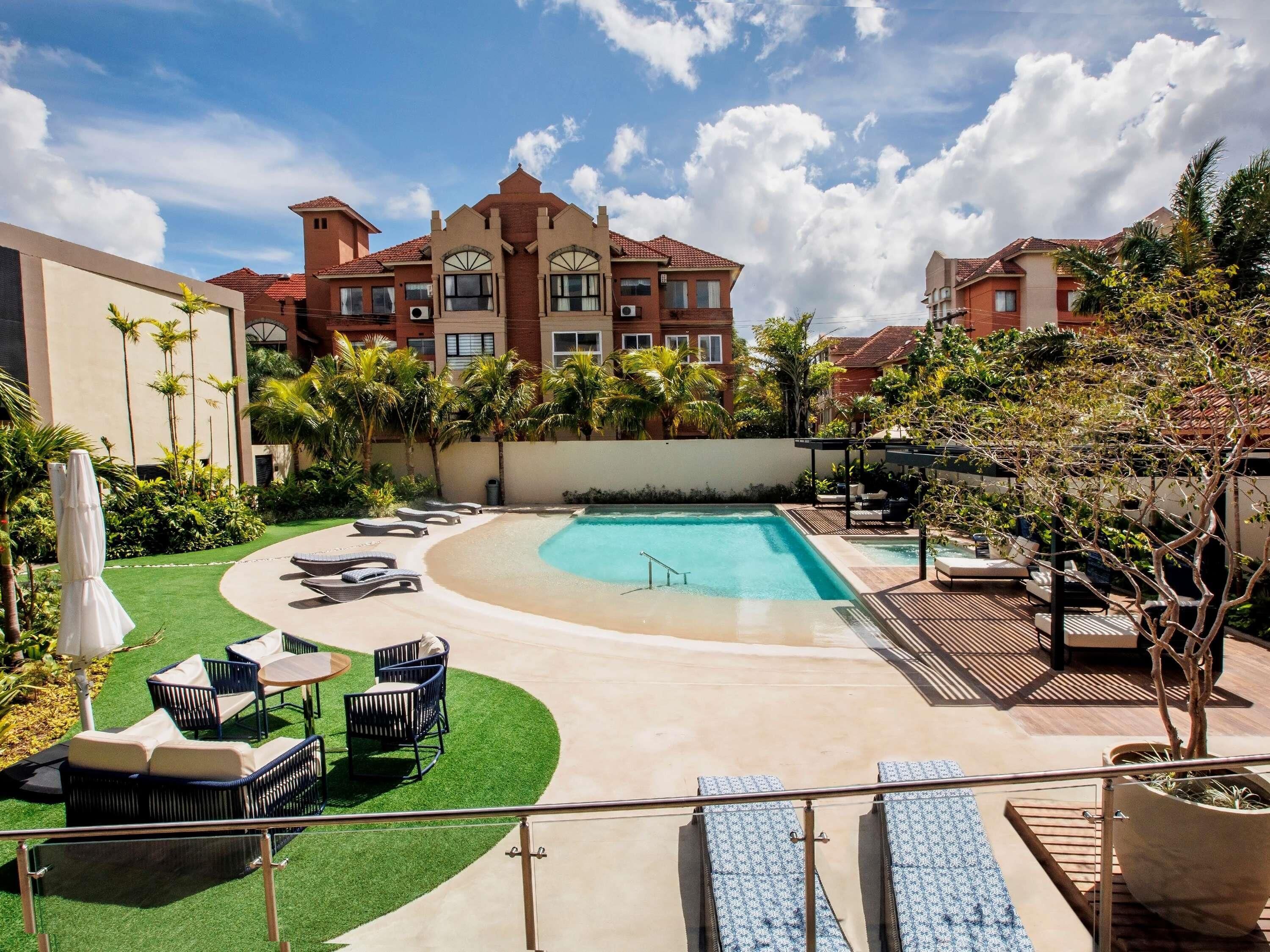 Outdoor pool, open 8:00 AM to 11:00 PM, free cabanas, pool umbrellas