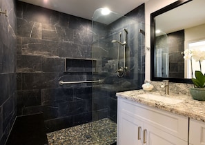 Combined shower/tub, hair dryer, towels, soap