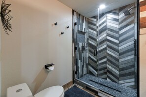 Combined shower/tub, hair dryer, towels, soap