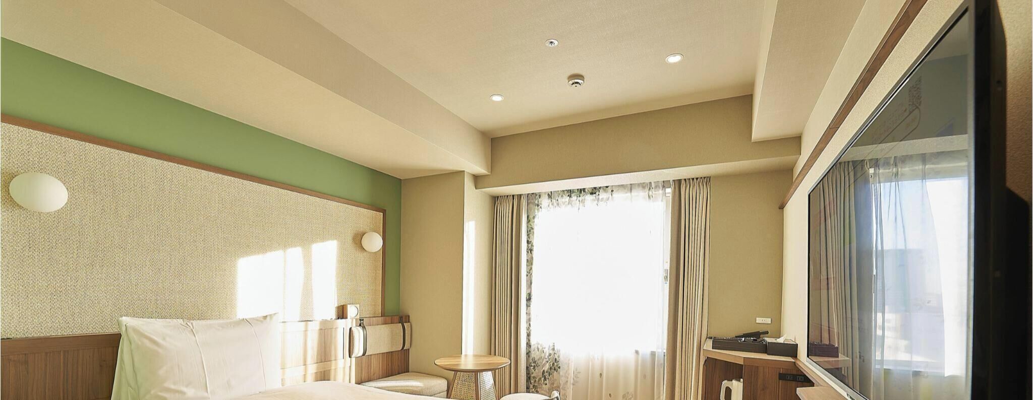 Down duvets, desk, laptop workspace, blackout curtains