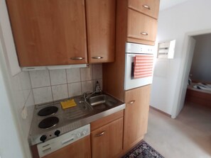 Fridge, coffee/tea maker, electric kettle, toaster