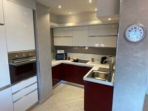 Fridge, microwave, oven, dishwasher - Romantica Suite modern apartment in Verbania Intra (Verbania)