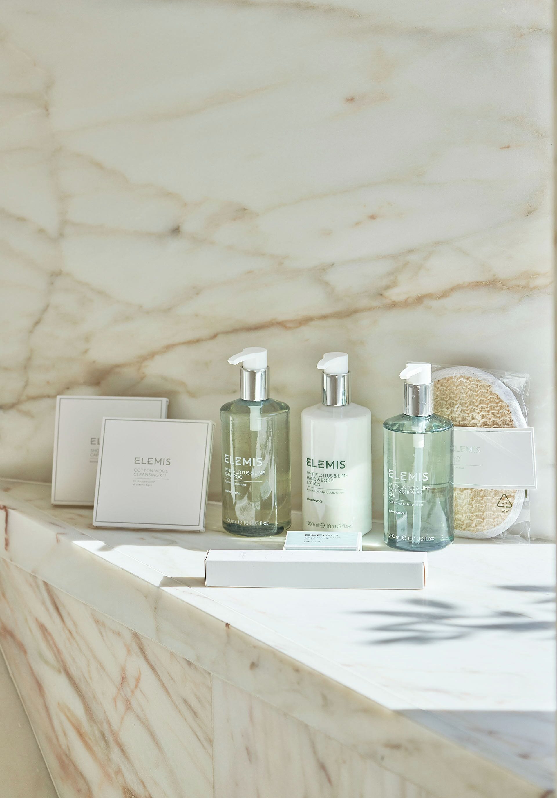 sky terrace signature suite | bathroom | separate bathtub and shower, rainfall showerhead, free toiletries