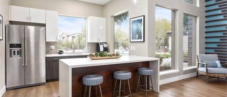 Coffee/tea maker, fridge, microwave, oven