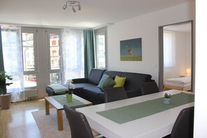 Comfort Apartment, 2 Bedrooms | Living area | Flat-screen TV - Herisau Apartments (Herisau)