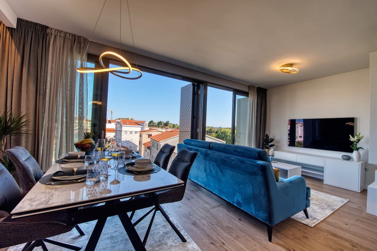 Luxury Apartment, 2 Bedrooms, Pool Access, Garden View | Living area | 80-cm Smart TV with satellite channels, TV