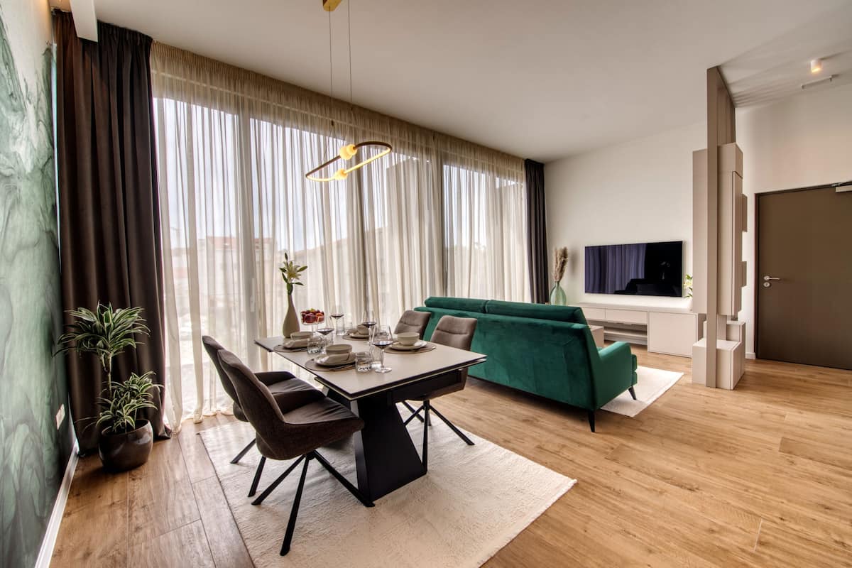 Exclusive Apartment, 2 Bedrooms, Pool Access, Garden View | Living area | 80-cm Smart TV with satellite channels, TV