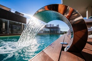 Outdoor pool, pool umbrellas, pool loungers