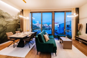 Exclusive Apartment, 2 Bedrooms, Pool Access, Garden View | Living area | 80-cm Smart TV with satellite channels, TV