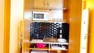 Fridge, microwave, cookware/dishes/utensils