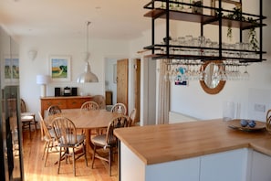 Dining - Comfortable family house, open plan kitchen/diner, sitting room, wood burner. (Polzeath, Cornwall)