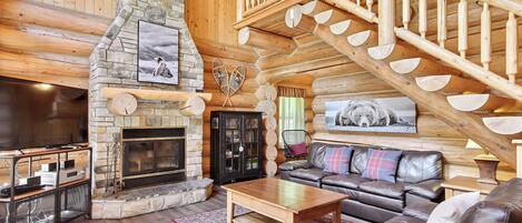 Télévision, cheminée, console de jeux vidéo, lecteur de DVD