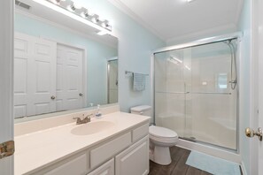 Bathtub, hair dryer, towels, soap