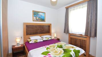 Deluxe Apartment, 1 Bedroom, Sea View | Individually decorated, individually furnished, desk, laptop workspace