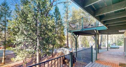 Lake-view home walkable to the beach/marina with pool, deck, Ping-Pong, & toys