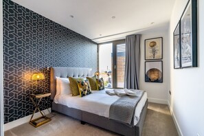 2 slaapkamers, een strijkplank/strijkijzer, internet