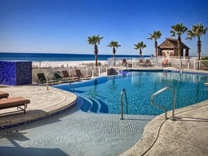 A pool with clear blue water, surrounded by palm trees and a beach view. - 1401 (NEW Purchase), East Wrap Ard. View, 2br, Slps8 (Reviews at vrbo.com/511877 (Orange Beach)