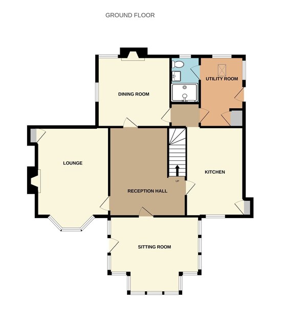 Un agencement au rez-de-chaussée comprenant un salon, une salle à manger, une buanderie, une cuisine, un hall d’entrée et un espace de détente.