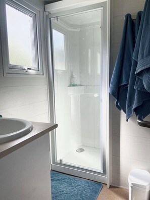 Chuveiro, secador de cabelo