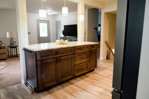 Combined shower/tub, hair dryer, towels, soap