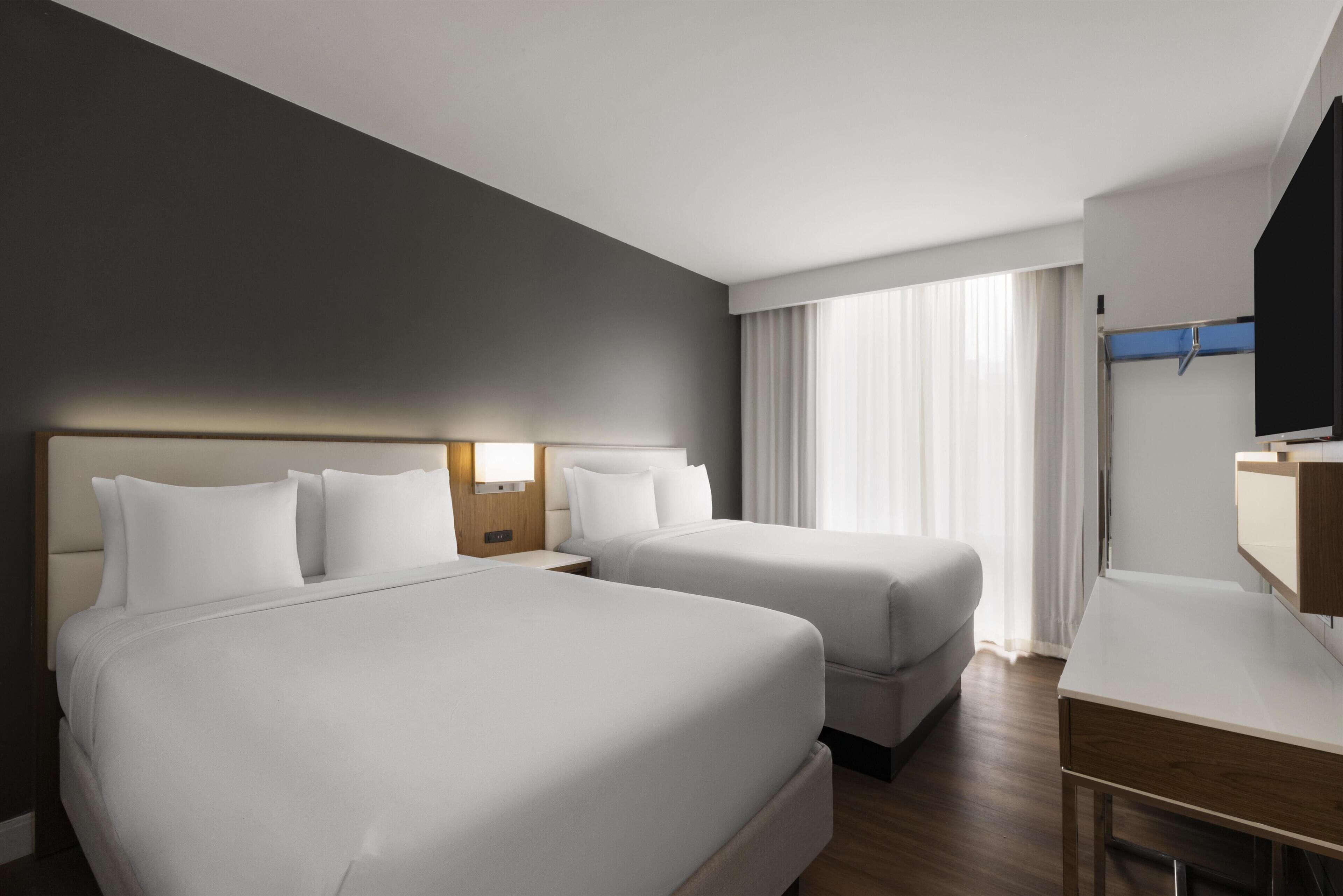 Suite, 2 tweepersoonsbedden, niet-roken, kitchenette (Living Room;with Sofabed) | Gratis wifi, beddengoed