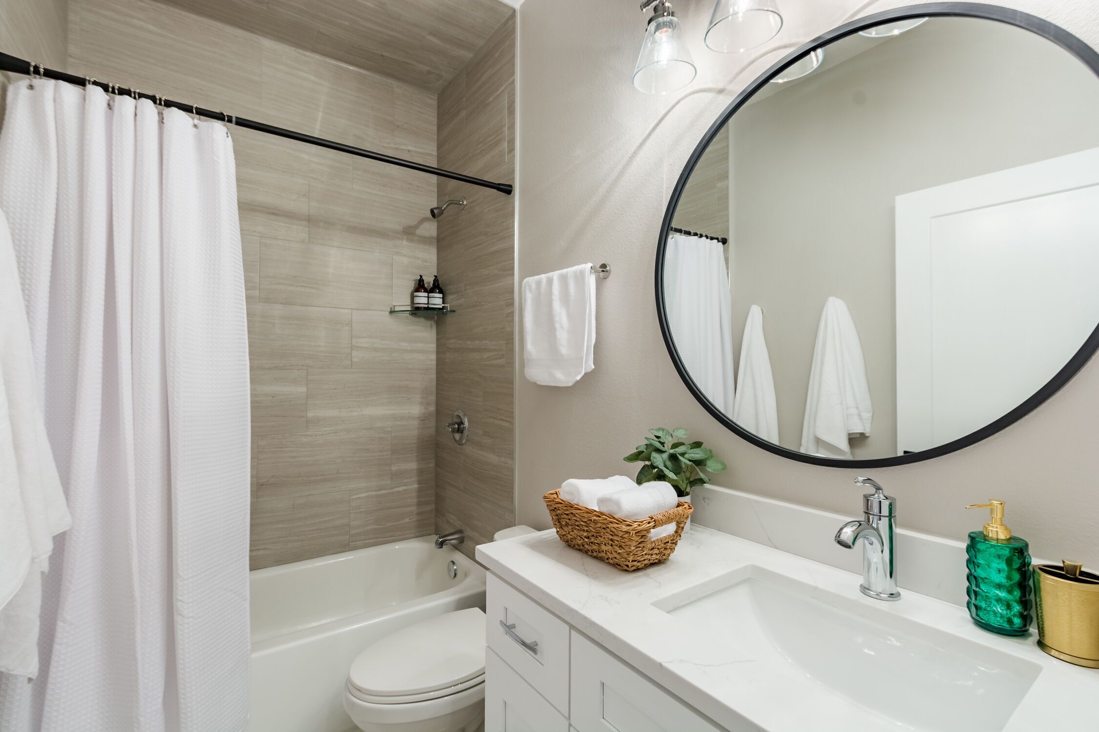 Combined shower/tub, hair dryer, towels, soap