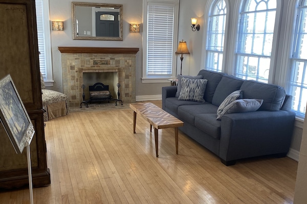 Living room sofa features a hide-and-bed.