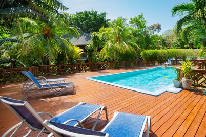Two Story 3/Bd 2Bath, w Pool and steps to the best snorkeling on the island