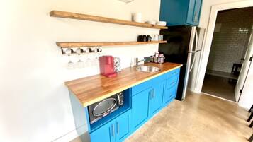 Fridge, microwave, coffee/tea maker, toaster