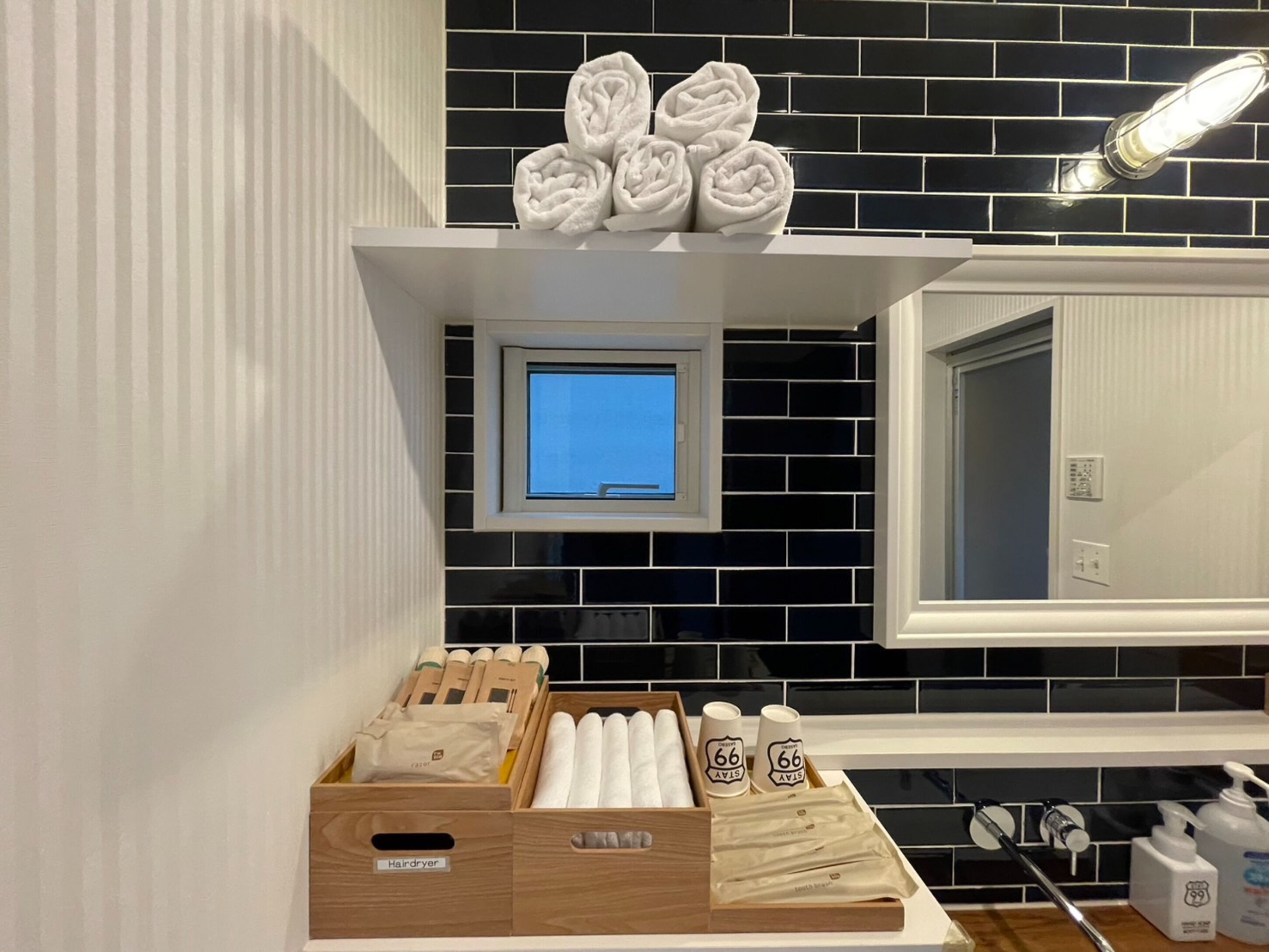 Separate tub and shower, hair dryer, slippers, electronic bidet