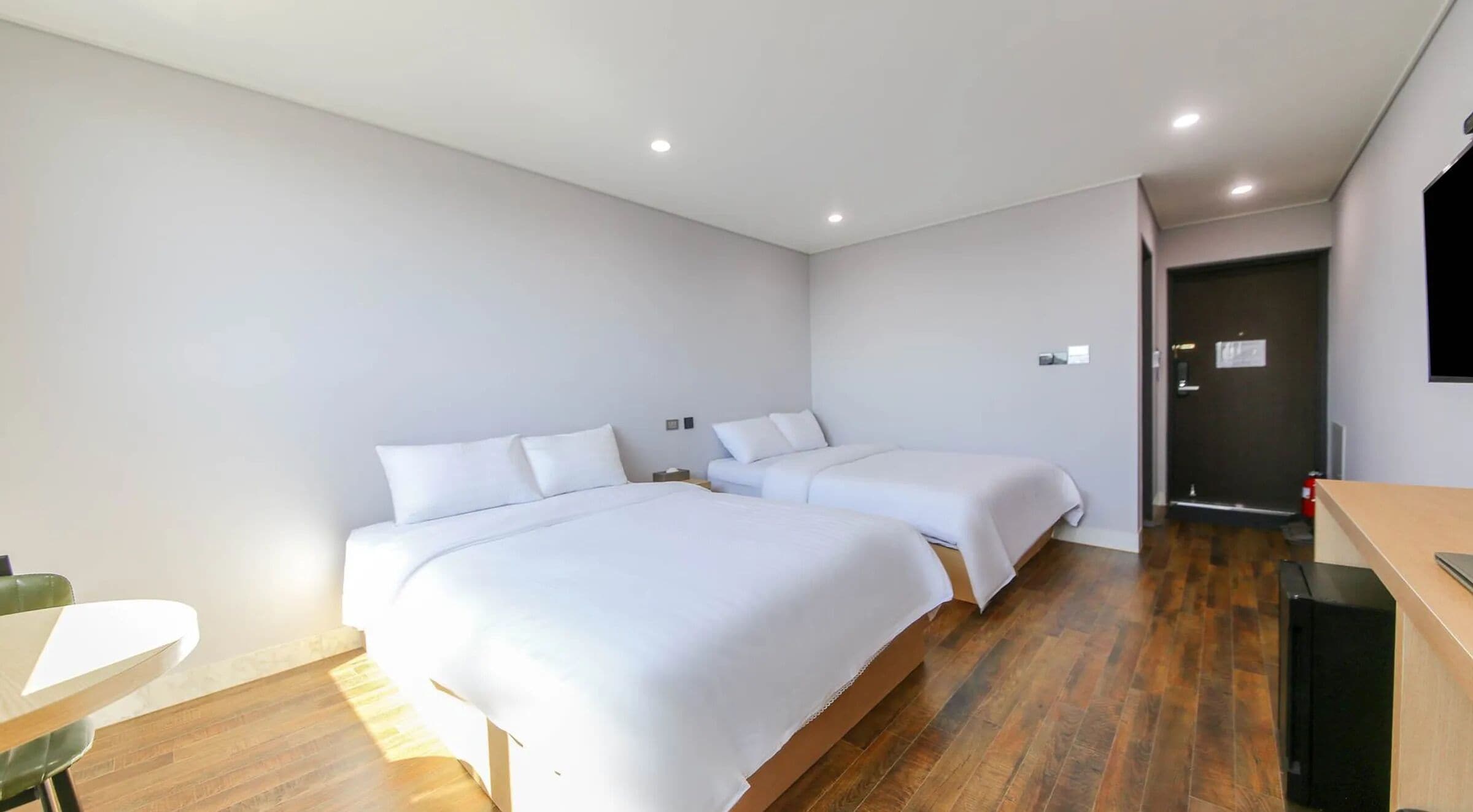 Double Twin Room | Down comforters, laptop workspace, free WiFi, bed sheets