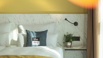 Hypo-allergenic bedding, in-room safe, soundproofing