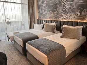Literie hypoallergénique, matelas mémoire de forme, minibar