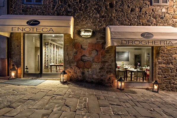 Experience the charm of historic architecture at this traditional building, home to ENOTECA and DROGHERIA.