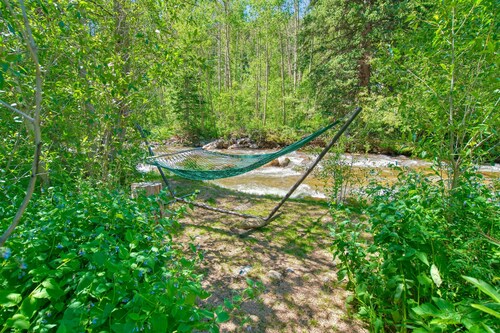 Rustic Riverside Cabin with Patio — Family Escape