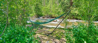 Rustic Riverside Cabin with Patio — Family Escape